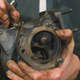 The wastegate shown here diverts exhaust gases around the turbine wheel . Photo: Jared Auslander
